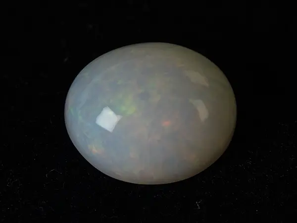 Ethiopian Fire Opal 6.60 Carat (7.25 Ratti) — Oval Cut 1 Ethiopian Fire Opal 6.60 Carat natural certified oval cut loose gemstone with vivid play-of-color
