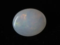 Ethiopian Fire Opal 6.60 Carat back view showing natural clarity and pavilion polish