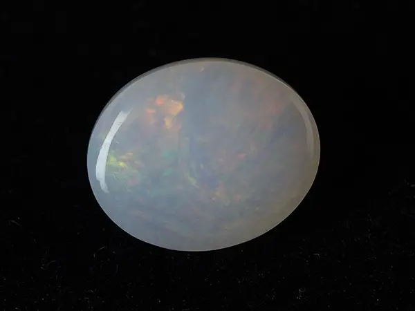 Ethiopian Fire Opal 6.60 Carat (7.25 Ratti) — Oval Cut 2 Ethiopian Fire Opal 6.60 Carat back view showing natural clarity and pavilion polish