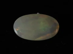 Ethiopian Fire Opal 6.61 Carat back view showing natural clarity and pavilion polish