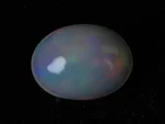 Natural Ethiopian Fire Opal 3.40 carat oval white with rainbow play-of-color