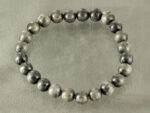 Full view of certified Lehsunia bracelet showing bead texture