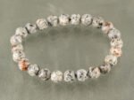 Natural Grey Jasper bracelet with grey and brown speckled beads isolated