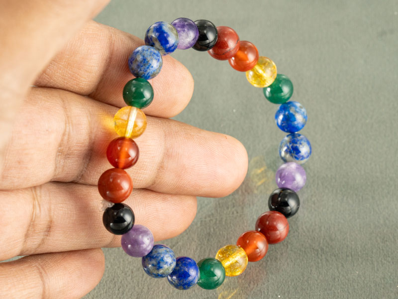 Natural Seven Chakra Bracelet (8mm Beads) 4 7 Chakra bead bracelet authentic stones isolated view