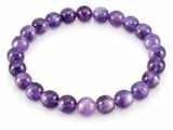 Amethyst bracelet with natural purple round beads 8mm on white background