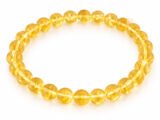 Citrine bracelet with natural yellow round beads 8mm on white background