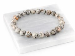Natural Grey Jasper bead bracelet angled display on selenite plate