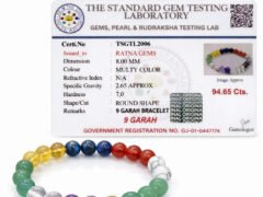 Official gem testing laboratory certificate for the Navratna 9 Garah bracelet, displaying a weight of 94.65 carats and 8mm dimension alongside the multi-color bracelet.