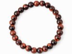 Natural Red Tiger Eye 8mm round bead bracelet isolated on a plain white background.