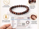 Infographic highlighting the natural Red Tiger Eye 8mm bracelet features, including natural chatoyancy, 100 percent genuine untreated stones, and gem testing certification.