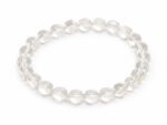 Natural Rock Crystal Sphatik 8mm round bead bracelet isolated on a plain white background.