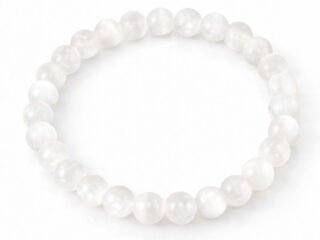 Natural Selenite 8mm round bead bracelet isolated on a plain white background.