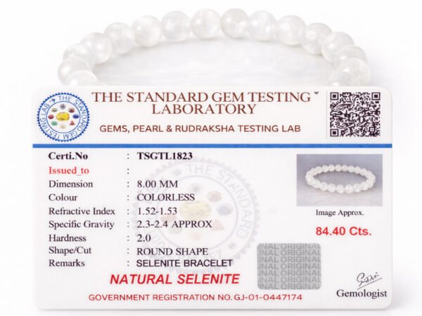 Close-up view of the official gem testing laboratory certificate for the natural Selenite bracelet, confirming its genuine status.
