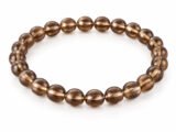 Natural Smoky Quartz 8mm round bead bracelet isolated on a plain white background.