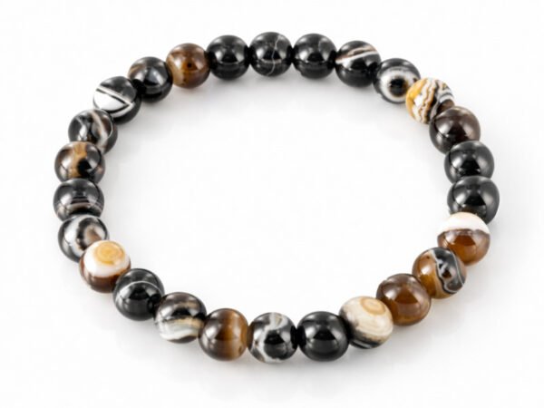 Natural Sulemani Hakik Black Agate 8mm round bead bracelet isolated on a plain white background.