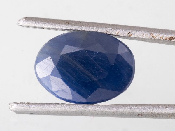 natural African blue sapphire Neelam 4.64 carat oval close-up loose stone