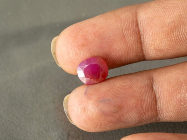 African Ruby 3.61 Carat in-hand size reference for jewelry setting