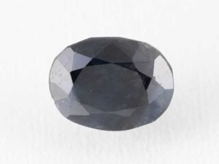Bangkok blue sapphire neelam 6.95 carat loose stone close-up deep navy blue