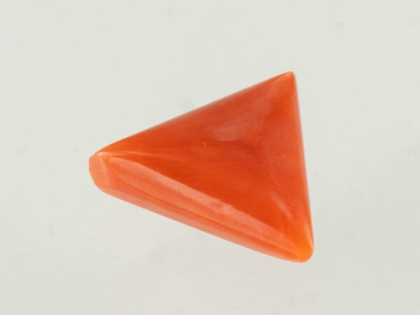 Italian red coral moonga 4.24 carat back profile triangle cabochon