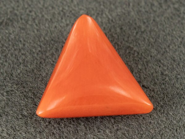 italian red coral moonga 4.26 carat main alt 2 view triangle gemstone