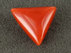 italian red coral moonga 4.29 carat main view triangle cabochon gemstone
