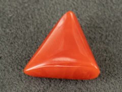italian red coral moonga 4.29 carat side profile triangle cabochon