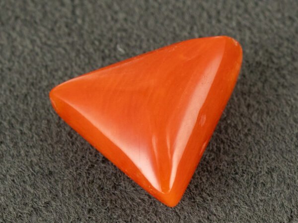 italian red coral moonga 4.32 carat side profile triangle cabochon