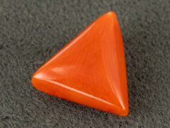 italian red coral moonga 4.32 carat primary view triangle cabochon gemstone