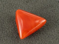 italian red coral moonga 4.33 carat side profile triangle cabochon
