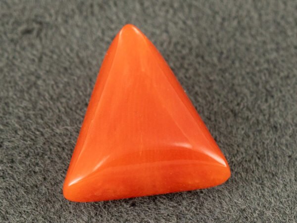 Italian red coral moonga 4.35 carat main view triangle cabochon stone