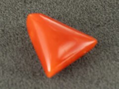 Italian red coral moonga 4.35 carat back profile triangle gemstone