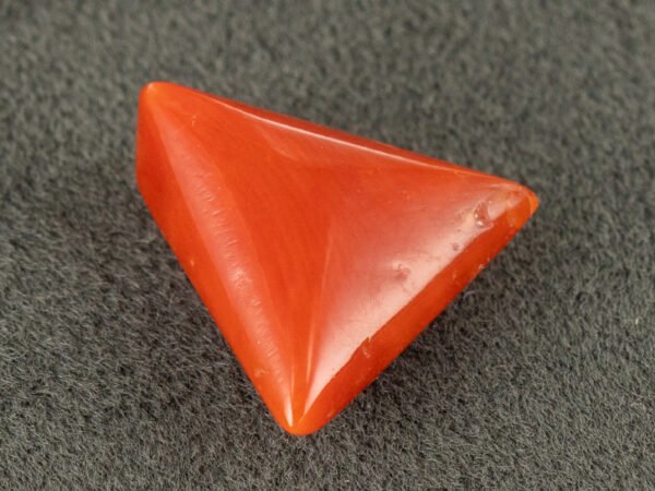 italian red coral moonga 4.36 carat back profile triangle gemstone
