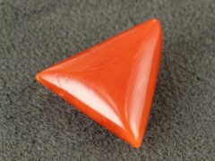 italian red coral moonga 4.36 carat side profile triangle cabochon