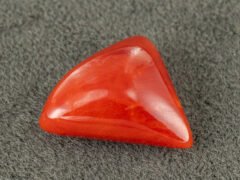 italian red coral moonga 4.39 carat main view triangle cabochon gemstone