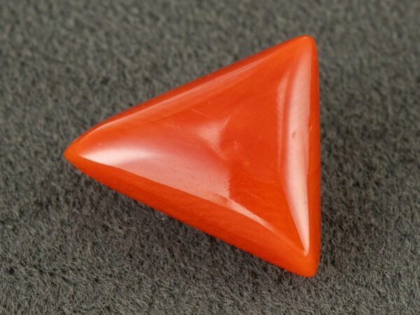 italian red coral moonga 4.41 carat side view triangle cabochon gemstone