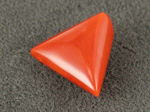 italian red coral moonga 4.43 carat side profile triangle cabochon