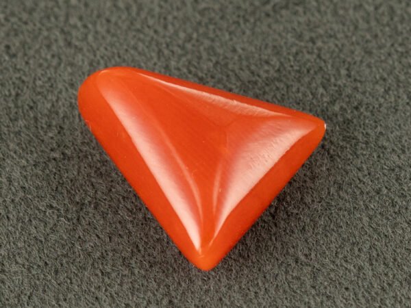 italian red coral moonga 4.44 carat side profile triangle cabochon