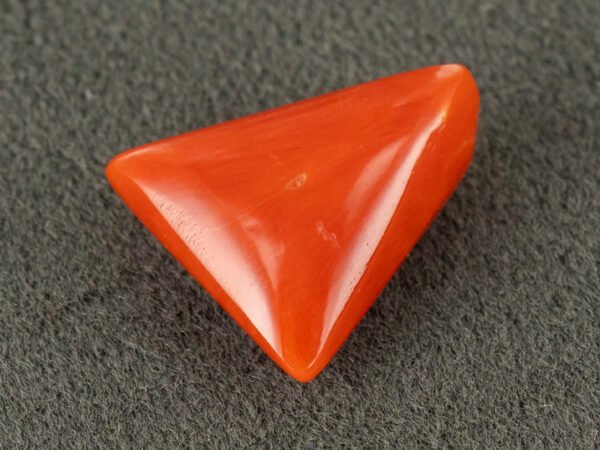 italian red coral moonga 4.44 carat side profile triangle cabochon
