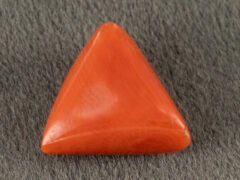 Italian red coral moonga 5.03 carat back profile triangle cabochon
