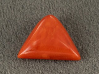 Italian red coral moonga 5.17 carat main view triangle cabochon stone