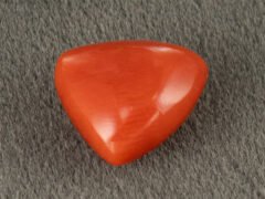 Italian red coral moonga 5.28 carat main view triangle cabochon stone