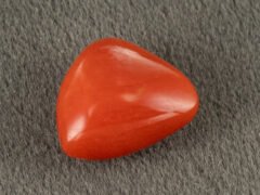 Italian red coral moonga 5.28 carat back profile triangle cabochon