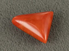 Italian red coral moonga 5.31 carat back profile triangle cabochon