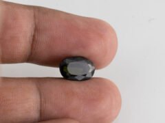 natural black tourmaline 3.68 carat in hand size small stone