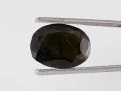 black tourmaline 5 carat side profile oval mixed cut
