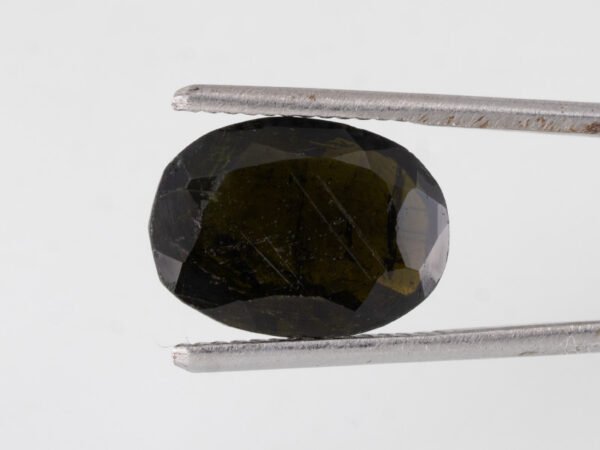 black tourmaline 5 carat side profile oval mixed cut
