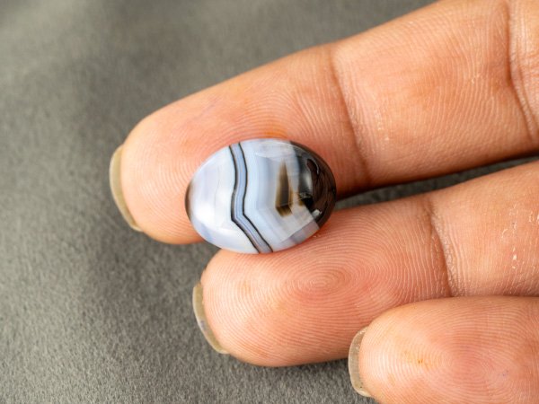 Sulemani Hakik 10.00 Carat in-hand size reference 17.6 x 14.2 mm