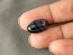 Sulemani Hakik 10.22 Carat in-hand size reference 20 x 12 mm