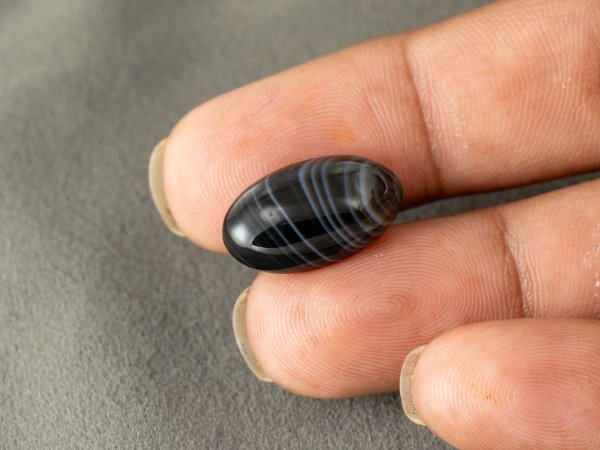 Sulemani Hakik 10.22 Carat in-hand size reference 20 x 12 mm