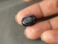 Sulemani Hakik 10.30 Carat in-hand size reference 17.4 x 13.7 mm